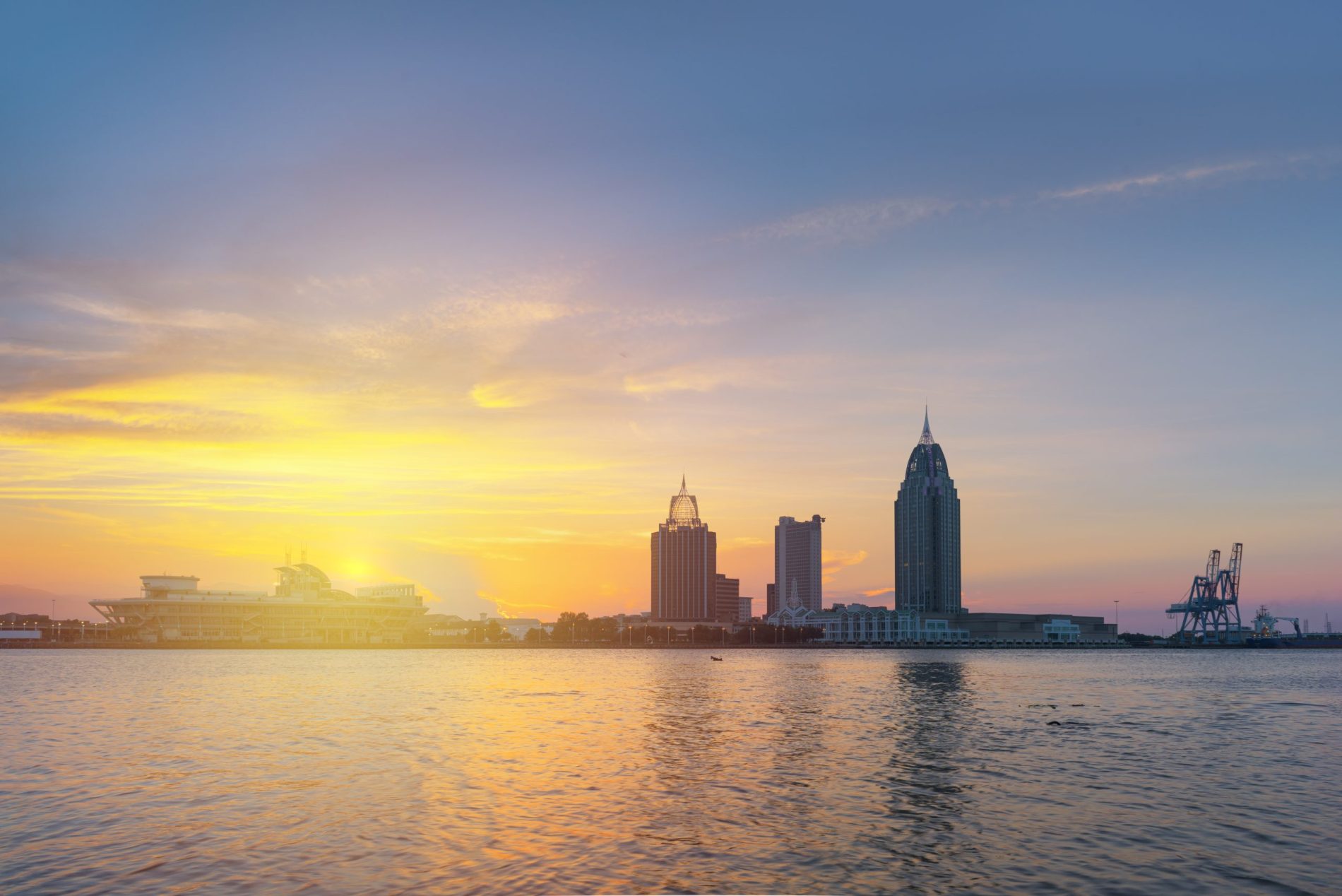 Mobile,Alabama,,Usa,Downtown,Skyline,On,The,River,At,Sunset.