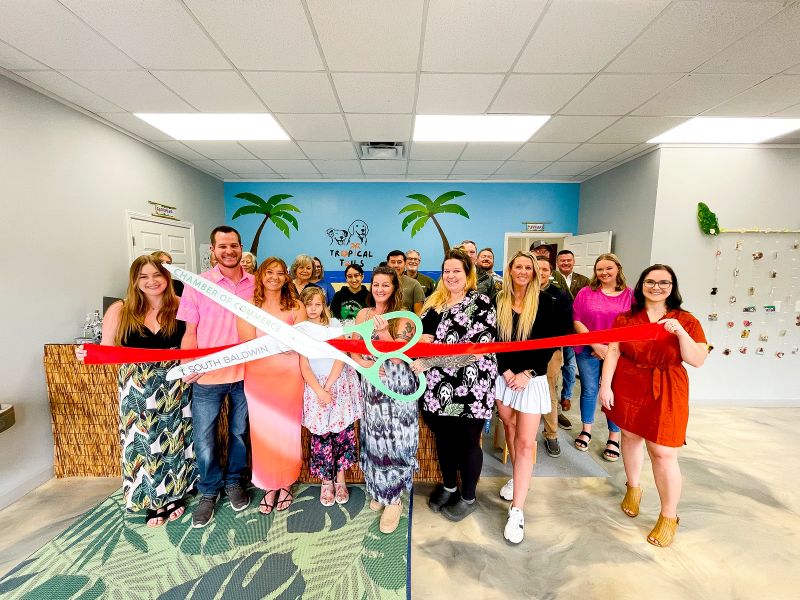 TROPICAL TAILS DOG BOARDING & DAYCARE NOW IN LARGER LOCATION