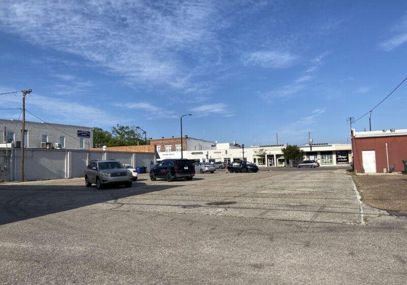 FOLEY TO BUY PARKING LOT AT HIGHWAYS 59 AND 98