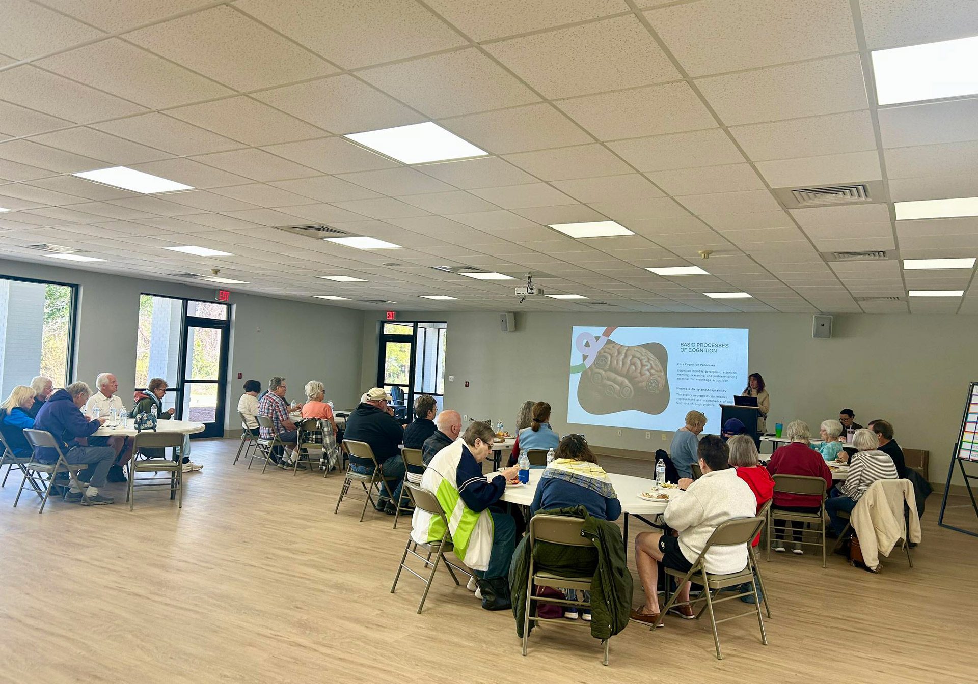 Kelly Cantrell speaking at a community event on speech pathology