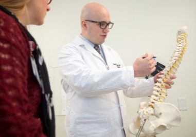 MENGER PRESENTS SPINAL DEFORMITY PROGRAM TO USF GRAND ROUNDS